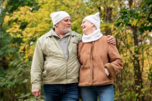 Elderly couple walking in nature