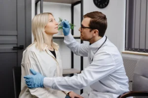 An ENT specialist diagnoses a deviated septum